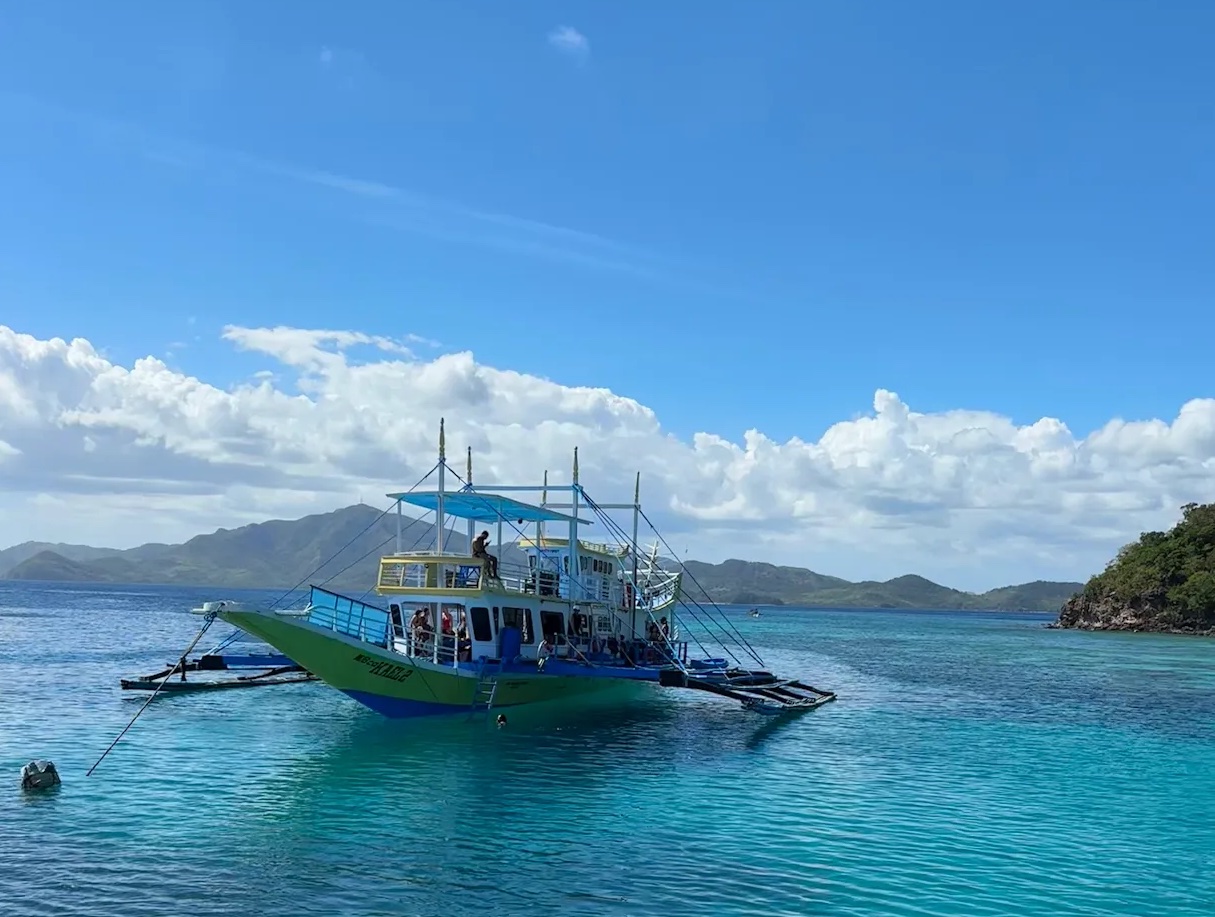 Expedition boat anchored among Palawan islands