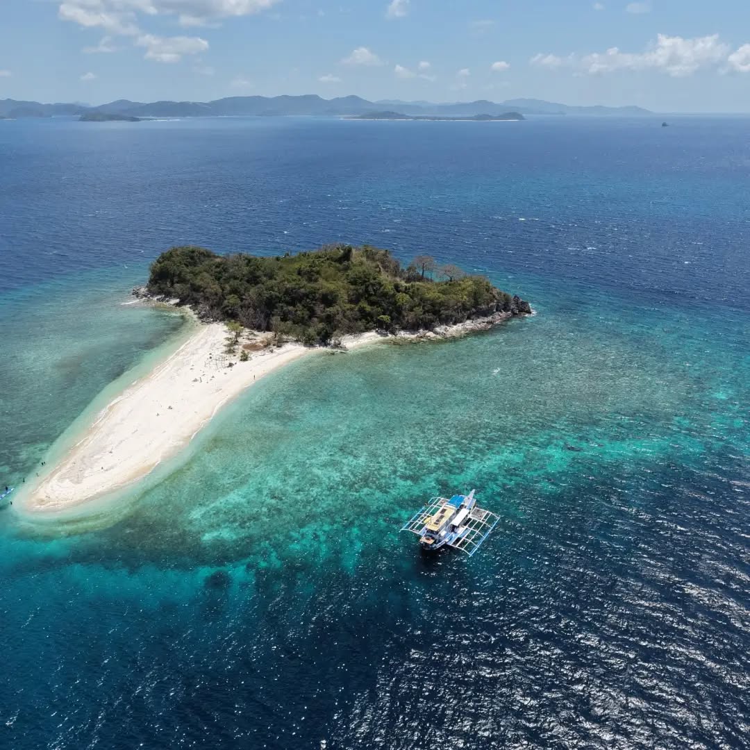 Island-hopping boat off the limestone coast of Coron